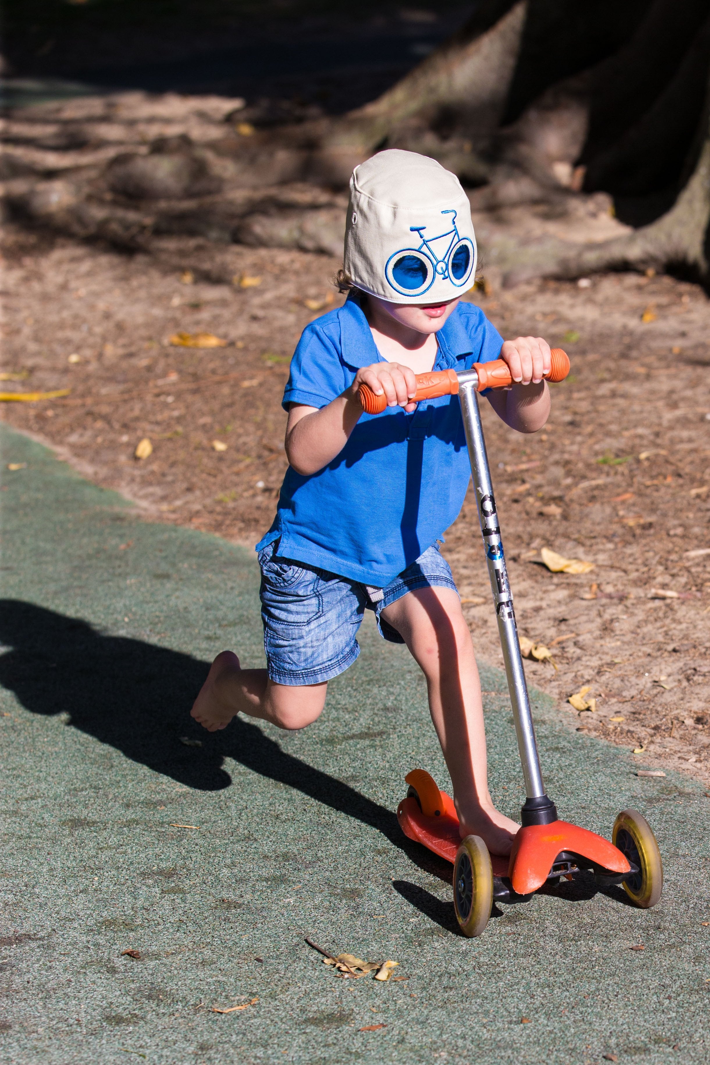 COOEEE Blue Bike Sunglasses Hat Tan and Blue with Blue Lenses by Boomerang Baby